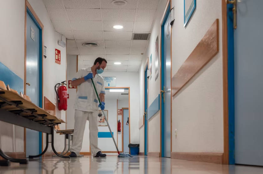 worker-mopping-hospital-floor-in-hospital