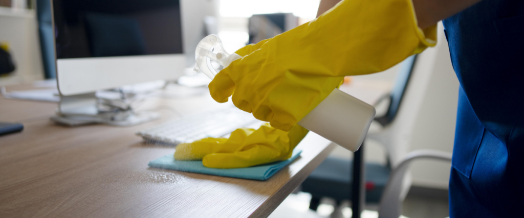 office-cleaning-wiping-desk-uni-hygiene